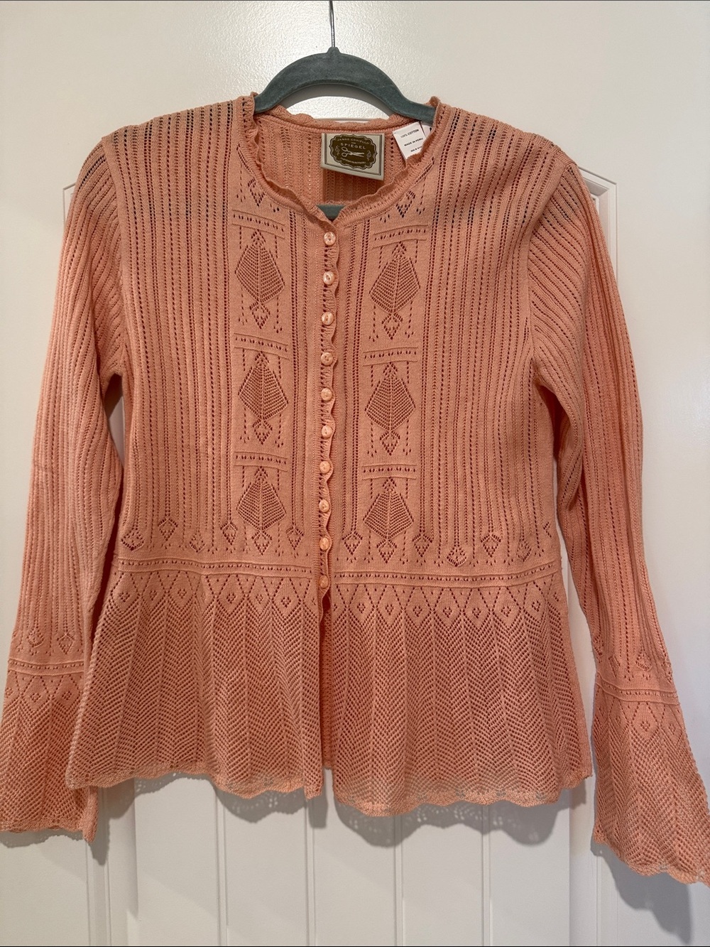 James Coviello for Spiegel cotton pointelle cardigan in a soft peach/coral color